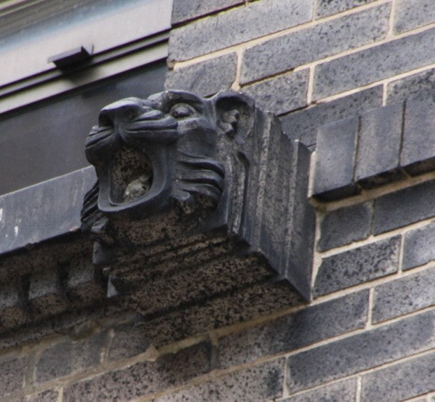 original early 20th century exterior michael reese hospital building facade hugh-garden-designed lion head fragment with unique speckled glazed finish