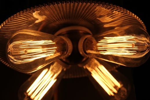 original early 20th century vintage american industrial benjamin four plug socket cluster or "plural lamp socket" with porcelain ring insulators