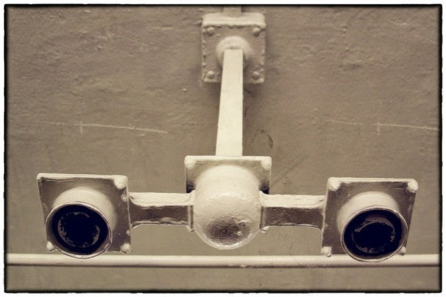 all original and nicely aged single cast bronze flush mount new york city subway "bare bulb" ceiling mount interior station light fixture with functional glazed brown socket