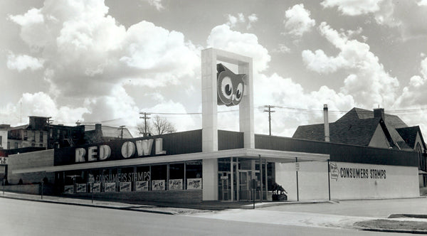 c. 1960's american vintage industrial lightweight painted red steel revolving clipper strip red owl grocery store product display rack with stationary four-legged base