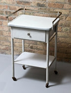 c. 1920's vintage medical operating room mobile supply cart with porcelain enameled table top