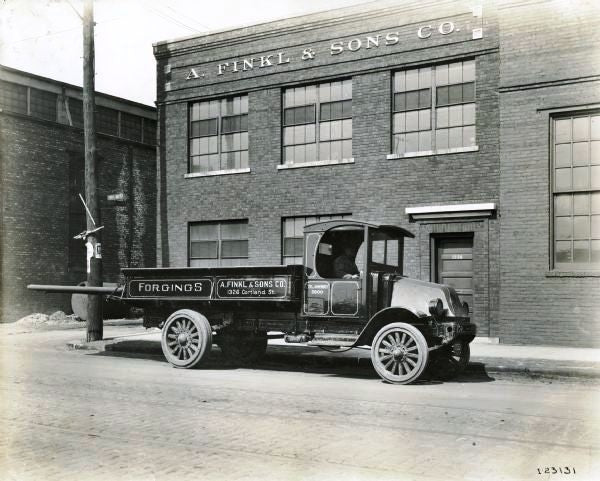 one of three original a. finkl & sons bricks with old inventory plaques salvaged from the company's foundry building after moving to the north side in 1902