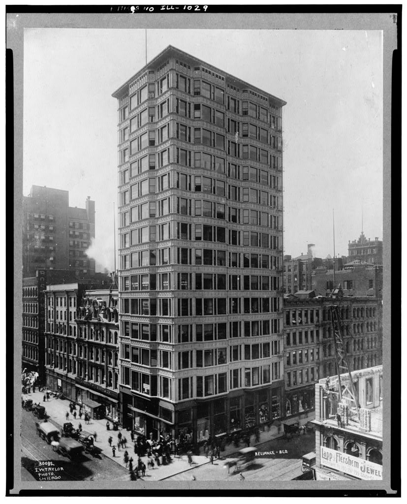 late 19th century original exterior reliance building interlocking facade curtain wall white glazed terra cotta panels accentuated with beads or buttons
