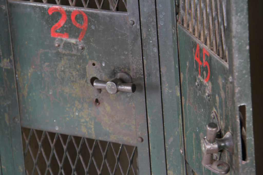 c. early 20th century american industrial federal "expanded metal" or diamond mesh four-unit factory locker with old green paint finish