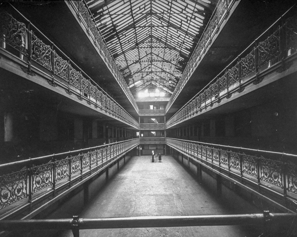 original 1892 edbrooke and burnham-designed ornamental cast iron newel post bottom cap from mecca flats