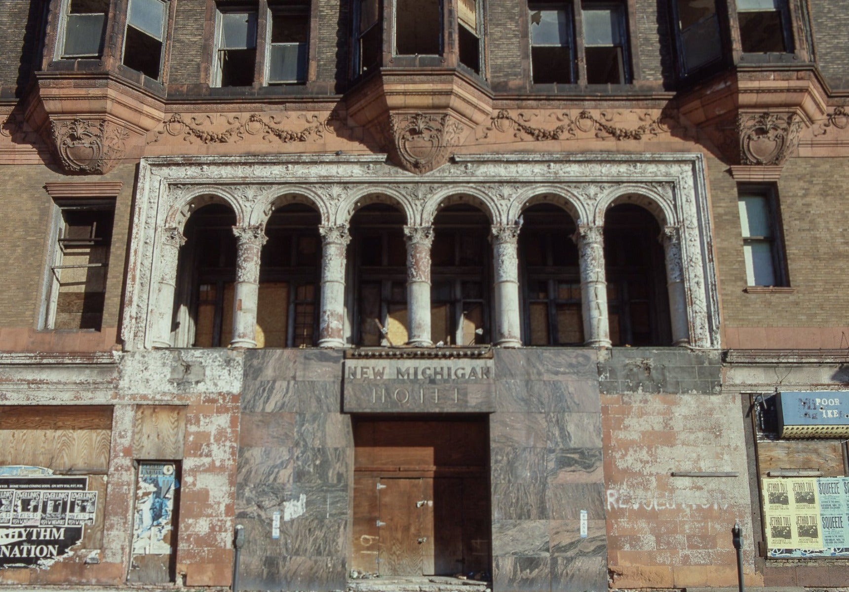 clinton j. warren-designed red slip glazed lexington hotel exterior loggia cartouche with lightly incised face