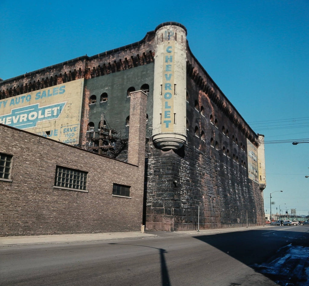 late 19th century cast brass interior wall sconce rosette and finial salvaged from burnham and root's first regiment armory building
