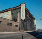 late 19th century cast brass interior wall sconce rosette and finial salvaged from burnham and root's first regiment armory building