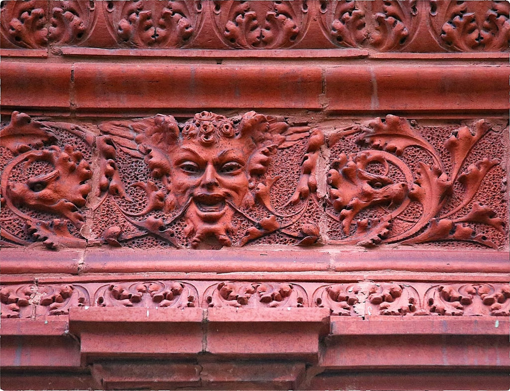 rare early to mid-1880s red slip glaze exterior residential northwestern terra cotta "satyr" figural panel or block