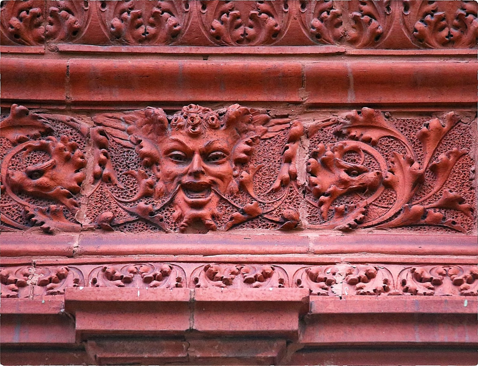 rare early to mid-1880s red slip glaze exterior residential northwestern terra cotta "satyr" figural panel or block