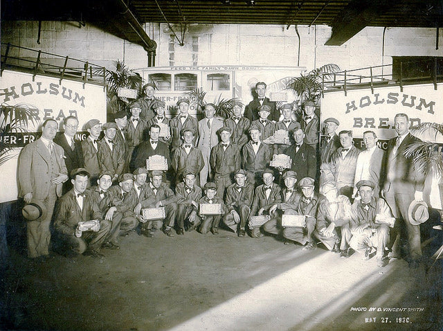 c. 1930's original american vintage industrial two-tier light weight cold-rolled steel "holsum" grocery store bread rack with a sturdy four-legged angle base