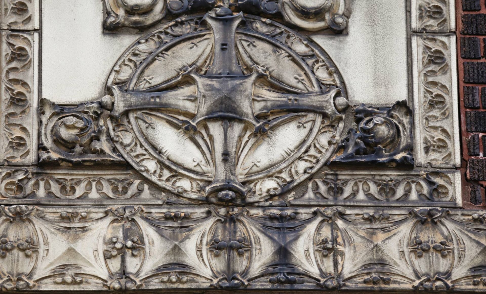three matching rissman and hirschfeld-designed cream glazed terra cotta sullivanesque blocks salvaged from lincoln-montana building