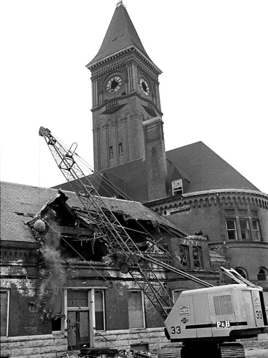 two original red slip terra cotta grotesque corbels salvaged from charles sumner frost's lake front railroad depot