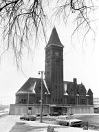 two original red slip terra cotta grotesque corbels salvaged from charles sumner frost's lake front railroad depot