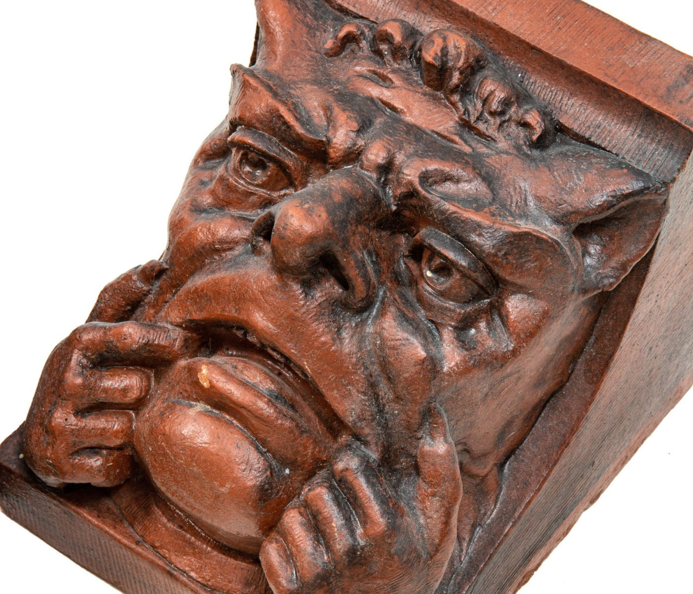 two original red slip terra cotta grotesque corbels salvaged from charles sumner frost's lake front railroad depot