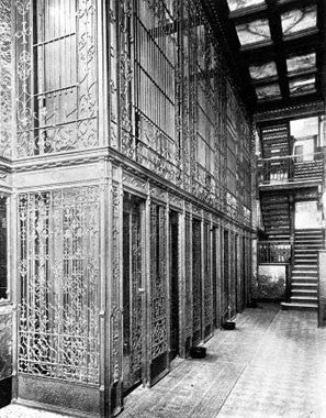 extravagant late 19th century original interior reliance office building ornamental wrought iron elevator grille or panel with abundant scrollwork