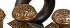 original 19th century american eastlake style "ceylon" pattern matching doorknobs and backplates salvaged from a chicago graystone