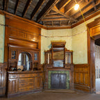 all original and amazingly intact late 1880's deeply embossed fruit and vine green majolica glazed fireplace mantel tile surround