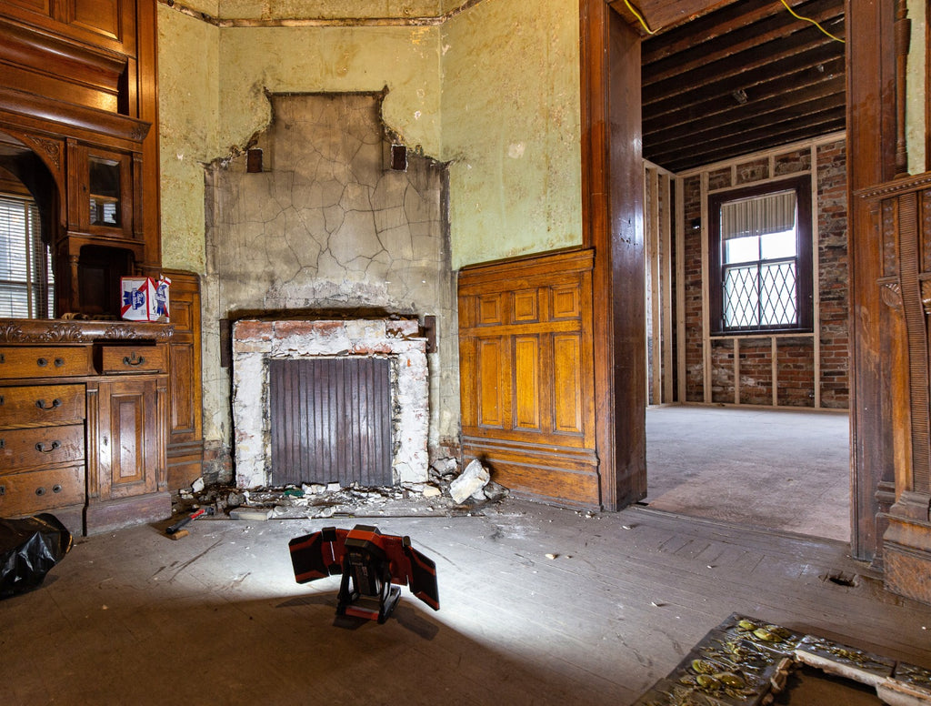 all original and amazingly intact late 1880's deeply embossed fruit and vine green majolica glazed fireplace mantel tile surround