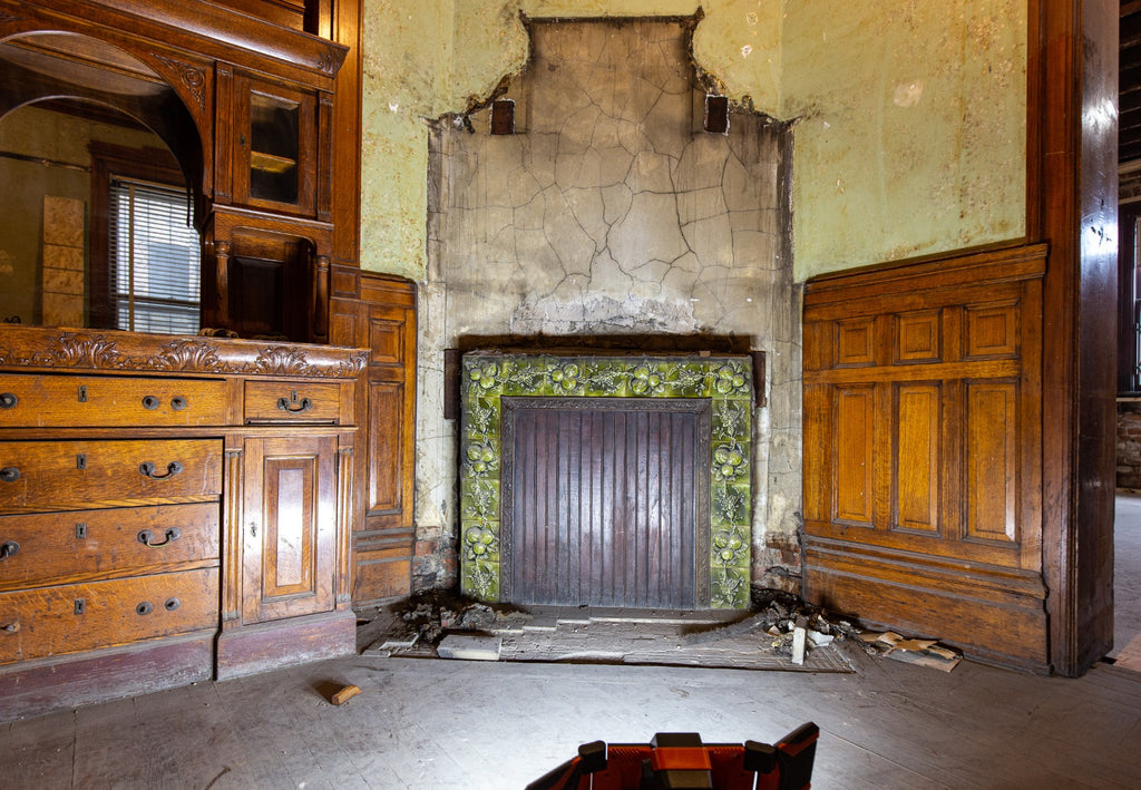 all original and amazingly intact late 1880's deeply embossed fruit and vine green majolica glazed fireplace mantel tile surround