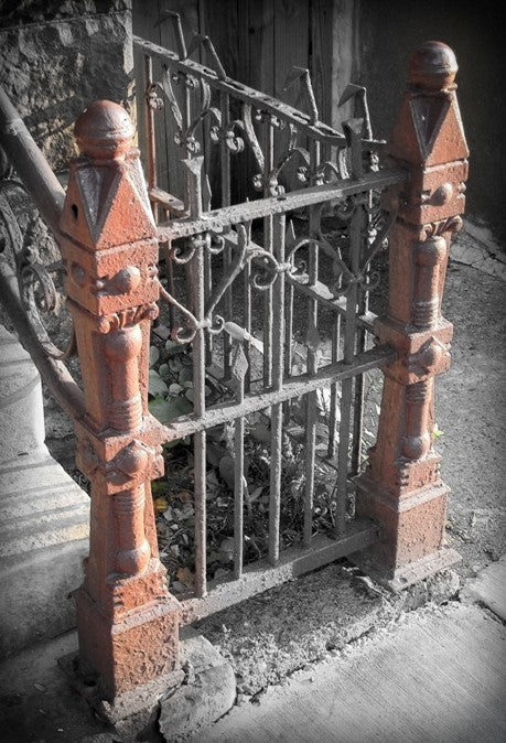 original freestanding c. 19th century american made victorian era ornamental cast iron "chicago style" exterior residential newel post