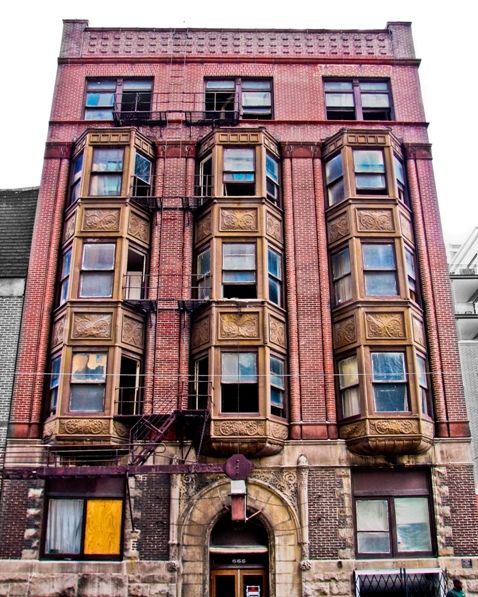 historically important 19th century red slip glaze erie hotel (later known as dana) richardsonian romanesque terra cotta capital