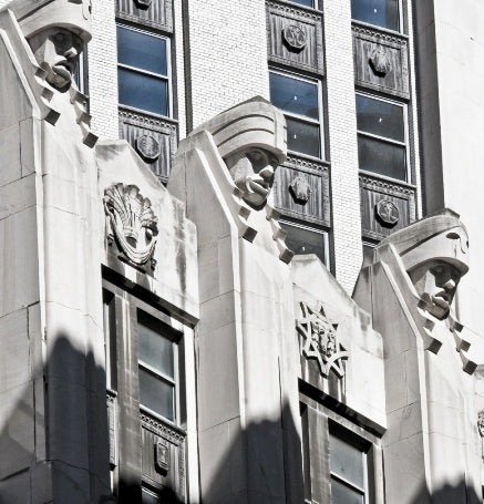 oversized early 1930's american depression-era ornamental cast iron city-bank farmers trust building interior elevator lobby arch top floor indicator plaque