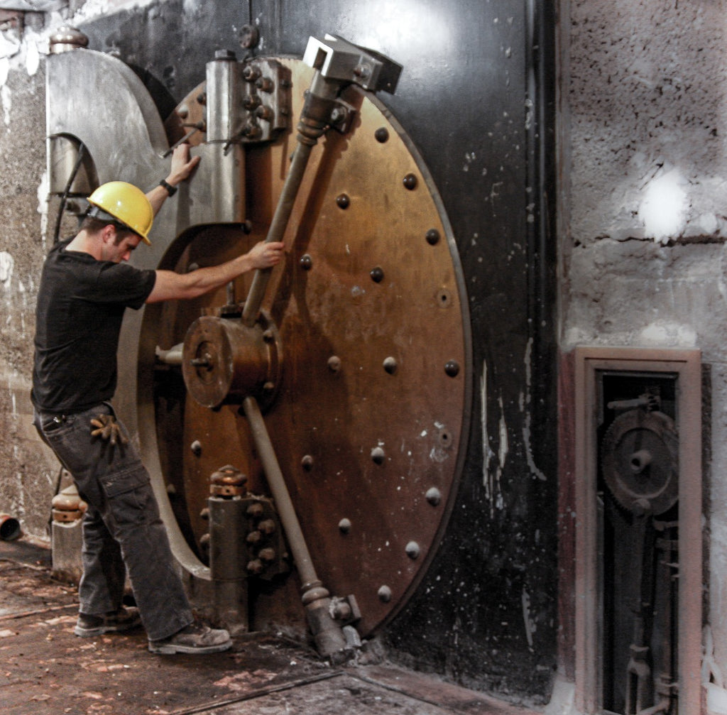 original polished cast bronze massive 1914 continental and commercial national bank building bank vault door hinge finial