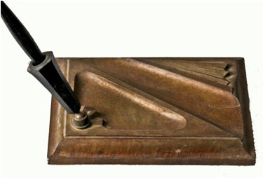 remarkably intact and original machine age art deco style cast iron table or desk pen stand
