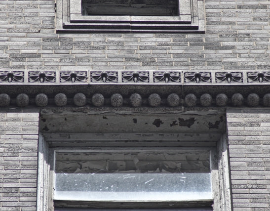 original 20th century american michael reese hospital "main building" exterior speckled stringer course fragment featuring intricately designed floral rosettes