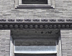original 20th century american michael reese hospital "main building" exterior speckled stringer course fragment featuring intricately designed floral rosettes