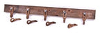 group of depression era american vintage industrial interchangeable wrought iron eye grab hooks possibly used on a farmstead conveyor system