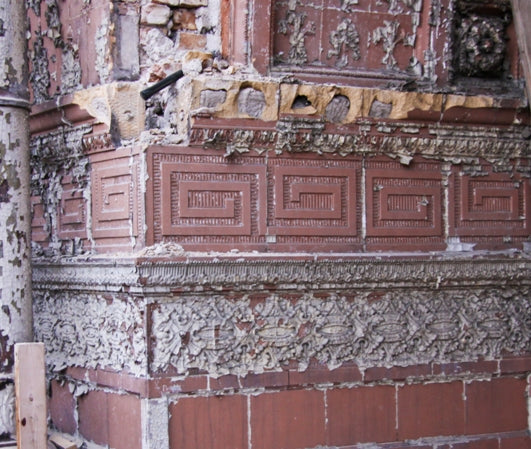 elegantly designed late 19th century ywca building exterior glazed terra cotta entrance surround frieze panel with salmon-colored finish