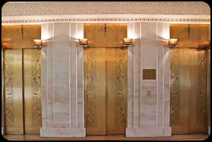 very impressive early 1930's american depression era museum-quality interior rookery building drummond elevator door transom panel with indicator