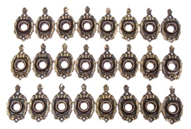 intact and remarkably rare large lot of 28 matching early 20th century ornamental cast brass doorknob rosettes
