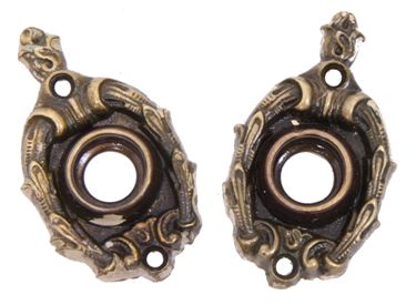 intact and remarkably rare large lot of 28 matching early 20th century ornamental cast brass doorknob rosettes