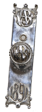 unusual nickel-plated late 19th century wainwright building doorknob and matching escutcheon