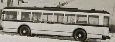 one of a kind exceptional handcrafted antique c. 1930's wpa depression era american folk art electric wisconsin gas & electric painted wood trolleybus with wheels