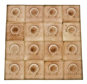large lot of matching late victorian era light pink majolica glazed fireplace tiles with shell motif