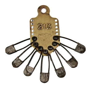 original and remarkably intact unique c. 1920's wall mount vintage industrial salvaged chicago laundry tag holder with numbered pins