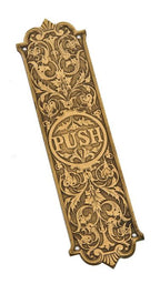 all original and highly sought after c. 1870's heavily ornamented cast bronze american victorian era interior residential swinging door figural push plate