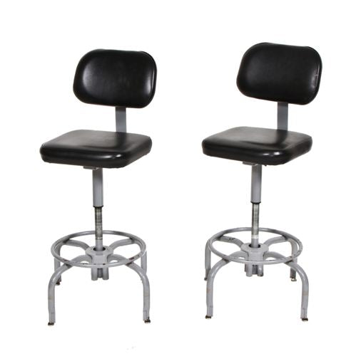 matching set of all original black upholstered c. 1950's "adjustrite" science laboratory bent tubular steel height stools