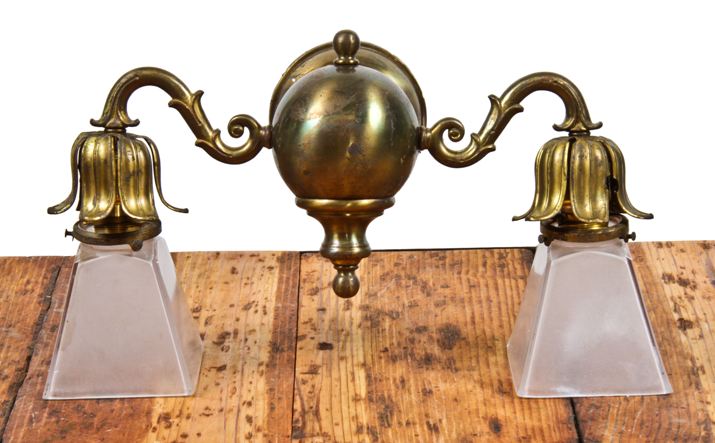 fanciful and fully intact 1910 2-arm dark brass interior residential wall sconce with glass pyramidal shades