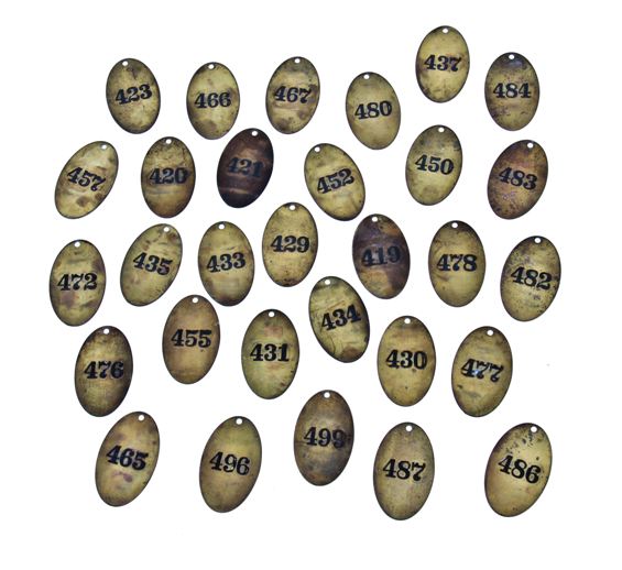 large lot of original early 20th century heavy cast brass ywca building door key fobs with deeply incised numbers