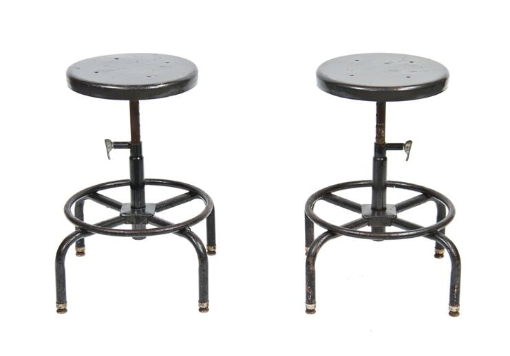 matching set of c. 1950's vintage industrial adjustable height metallic black enameled steel science laboratory stools