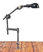 hard to find completely intact c. 1943-45 vintage industrial articulating arm "woodward" task lamp with unique circular friction plate joint
