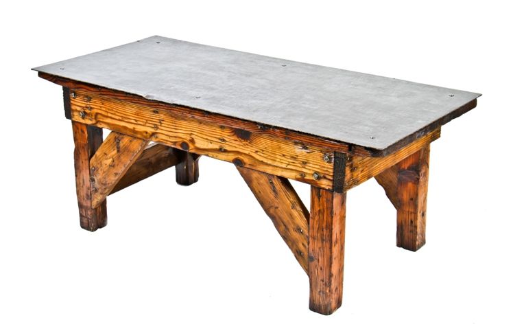 early 20th century antique american industrial salvaged chicago four-legged factory machine shop table with steel deck