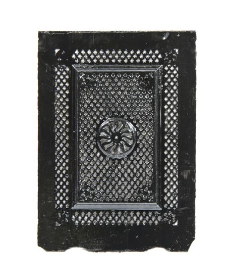 19th century interior residential ornamental black enameled cast iron summer cover with centrally located floral rosette