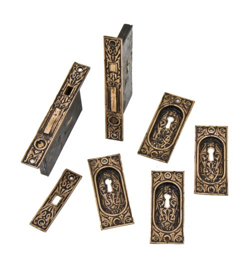 late 19th century ornamental cast brass interior residential double pocket door escutcheons with matching mortise locks