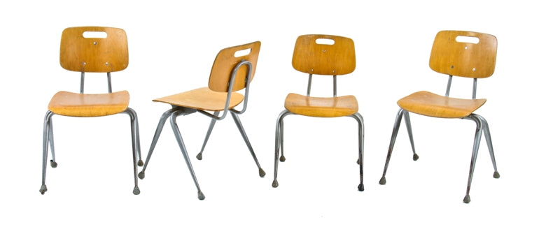 set of four matching mid-century modern "brunswick" bowling alley side chairs with bent tubular steel legs
